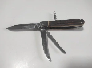 Mikov kapesní zavírací nůž s pilkou