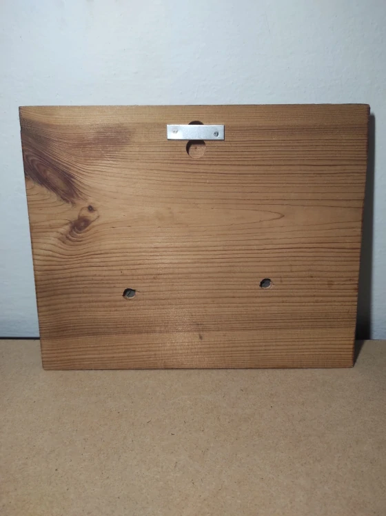 Retro odlitek Tatra na dřevěné desce 