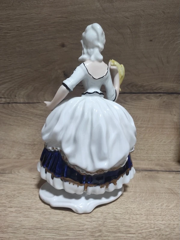 Porcelánová soška Janina Dikolenko – Dáma s papouškem (60. léta)