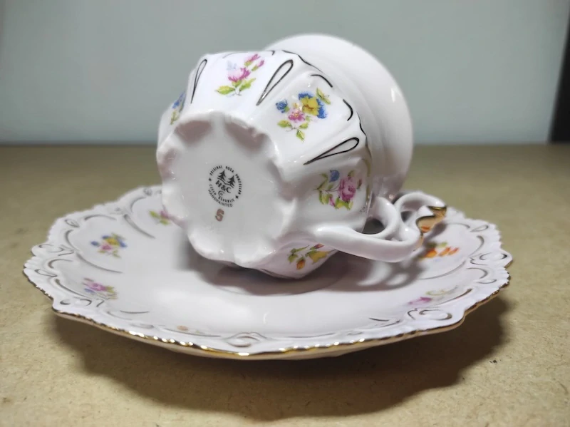 Šálek s podšálkem H&C Chodov