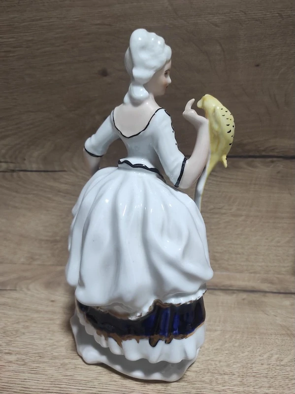 Porcelánová soška Janina Dikolenko – Dáma s papouškem (60. léta)